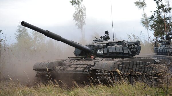 Танк Т-72Б3 во время батальонных тактических учений. Архивное фото Танк Т-72Б3 во время батальонных тактических учений. Архивное фото