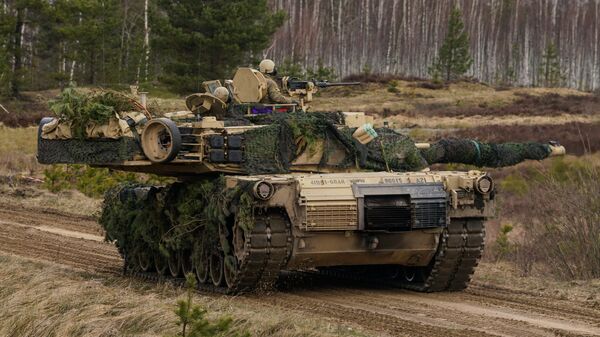 Танк M1 Abrams на международных военных учениях Summer Shield XIV в Латвии Танк M1 Abrams на международных военных учениях Summer Shield XIV в Латвии