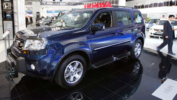 Автомобиль Honda Pilot на Московском международном автосалоне. Архивное фото. Автомобиль Honda Pilot на Московском международном автосалоне. Архивное фото.