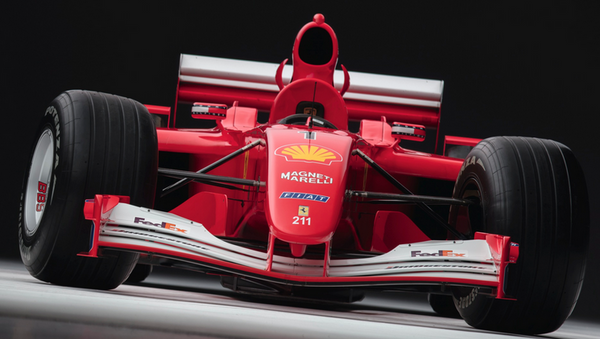 Гоночный болид Ferrari, на котором Михаэль Шумахер выиграл Гран-при Монако. Архивное фото Гоночный болид Ferrari, на котором Михаэль Шумахер выиграл Гран-при Монако. Архивное фото