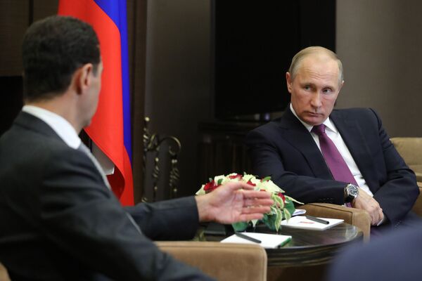 Президент РФ Владимир Путин и президент Сирии Башар Асад во время встречи Президент РФ Владимир Путин и президент Сирии Башар Асад во время встречи