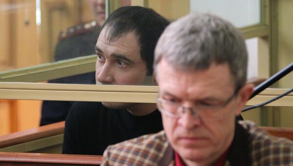 Сергей Синельник, обвиняемый в бандитизме и убийствах, во время судебного заседания в Ростовском областном суде. 24 февраля 2016 года Сергей Синельник, обвиняемый в бандитизме и убийствах, во время судебного заседания в Ростовском областном суде. 24 февраля 2016 года