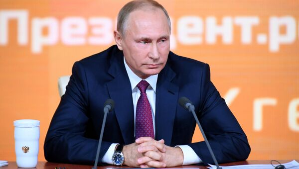 Президент РФ Владимир Путин во время большой ежегодной пресс-конференции Президент РФ Владимир Путин во время большой ежегодной пресс-конференции