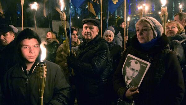 Участники марша националистов, приуроченного к 109-й годовщине со дня рождения Степана Бандеры, во Львове Участники марша националистов, приуроченного к 109-й годовщине со дня рождения Степана Бандеры, во Львове