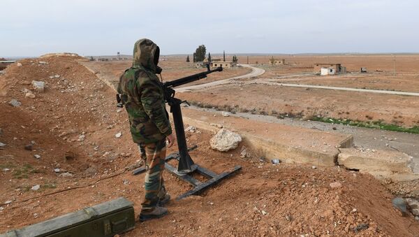 Сирийский военнослужащий в аэропорту Абу-Дхоу в провинции Идлиб, Сирия. Архивное фото Сирийский военнослужащий в аэропорту Абу-Дхоу в провинции Идлиб, Сирия. Архивное фото