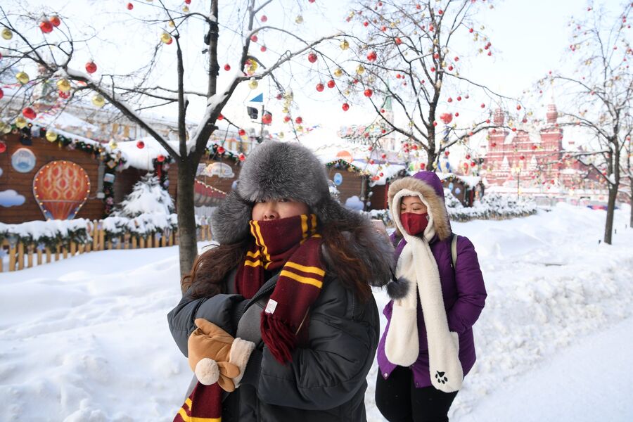 Туристы на Красной площади в Москве Туристы на Красной площади в Москве