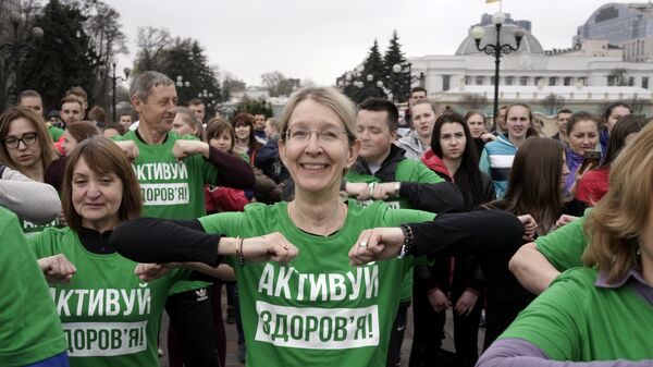 Исполняющая обязанности министра здравоохранения Украины Ульяна Супрун во время зарядки во Всемирный день здоровья в Киеве. 7 апреля 2017 Исполняющая обязанности министра здравоохранения Украины Ульяна Супрун во время зарядки во Всемирный день здоровья в Киеве. 7 апреля 2017