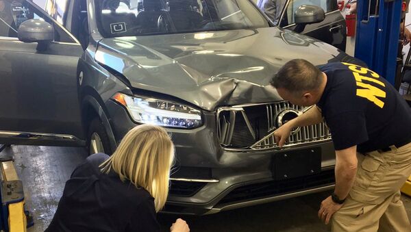 Беспилотный автомобиль Uber, сбивший велосипедистку в американском городе Темпе. Архивное фото Беспилотный автомобиль Uber, сбивший велосипедистку в американском городе Темпе. Архивное фото