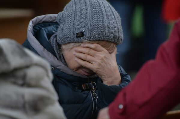Родственница одного из пропавших без вести при пожаре в торговом центре Зимняя вишня в Кемерово. 26 марта 2018 Родственница одного из пропавших без вести при пожаре в торговом центре Зимняя вишня в Кемерово. 26 марта 2018