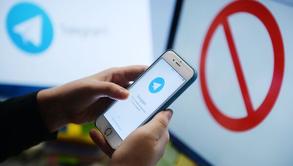 Логотип мессенджера Telegram. Архивное фото Логотип мессенджера Telegram. Архивное фото