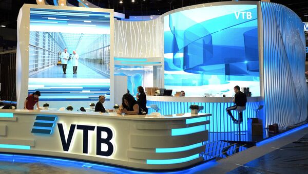 Стенд банка ВТБ в конгрессно-выставочном центре Экспофорум накануне открытия Санкт-Петербургского международного экономического форума Стенд банка ВТБ в конгрессно-выставочном центре Экспофорум накануне открытия Санкт-Петербургского международного экономического форума