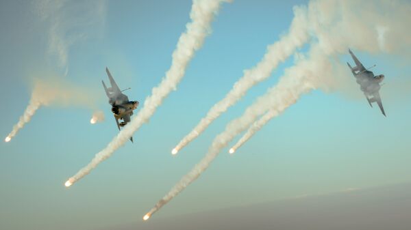 Самолеты сил коалиции F-15E во время операции Непоколебимая решимость Самолеты сил коалиции F-15E во время операции Непоколебимая решимость