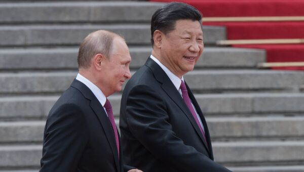 Президент РФ Владимир Путин и председатель КНР Си Цзиньпин. Архивное фото Президент РФ Владимир Путин и председатель КНР Си Цзиньпин. Архивное фото