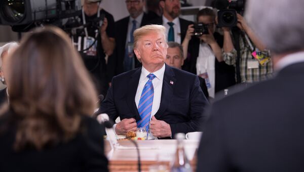 Президент США Дональд Трамп на саммите G7. 9 июня 2018 Президент США Дональд Трамп на саммите G7. 9 июня 2018