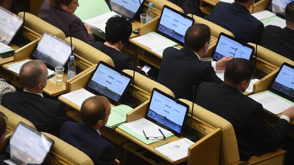Депутаты на первом заседании Государственной Думы РФ нового созыва Депутаты на первом заседании Государственной Думы РФ нового созыва