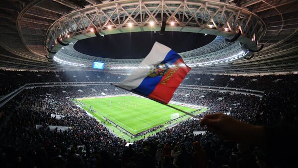Флаг России на трибуне стадиона Лужники в Москве Флаг России на трибуне стадиона Лужники в Москве