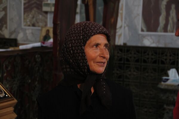 Послушница Нина из Русского странноприимного дома у места крещения Христа на реке Иордан Послушница Нина из Русского странноприимного дома у места крещения Христа на реке Иордан
