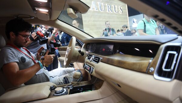 Журналисты на презентации автомобиля Aurus Senat на Московском международном автомобильном салоне 2018 Журналисты на презентации автомобиля Aurus Senat на Московском международном автомобильном салоне 2018