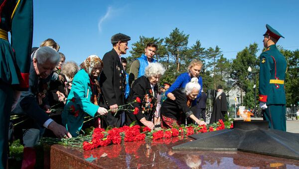 Торжества в честь окончания Второй мировой войны и освобождения Южного Сахалина и Курильских островов на площади Славы в областном центре Сахалинской области. 2 сентября 2018 Торжества в честь окончания Второй мировой войны и освобождения Южного Сахалина и Курильских островов на площади Славы в областном центре Сахалинской области. 2 сентября 2018