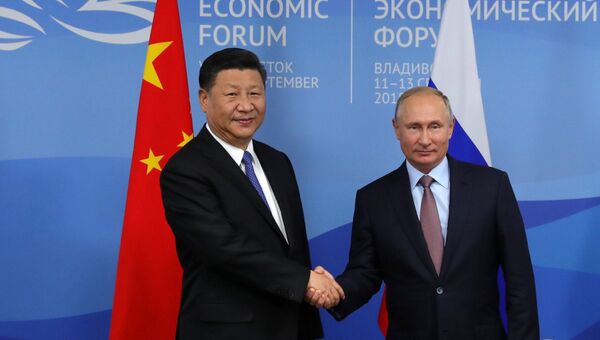 Президент РФ Владимир Путин и председатель КНР Си Цзиньпин Президент РФ Владимир Путин и председатель КНР Си Цзиньпин