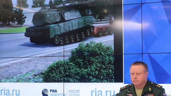 Николай Паршин во время брифинга министерства обороны РФ по вновь открывшимся обстоятельствам крушения самолета Boeing 777 авиакомпании Malaysia Airlines на востоке Украины Николай Паршин во время брифинга министерства обороны РФ по вновь открывшимся обстоятельствам крушения самолета Boeing 777 авиакомпании Malaysia Airlines на востоке Украины