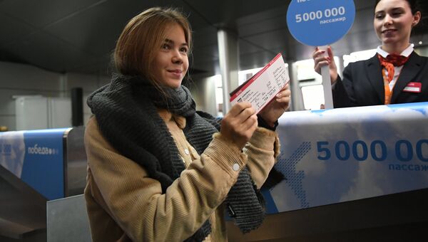 Студентка МГЮА Полина Казаева, ставшая пяти миллионным пассажиром авиакомпании Победа Студентка МГЮА Полина Казаева, ставшая пяти миллионным пассажиром авиакомпании Победа
