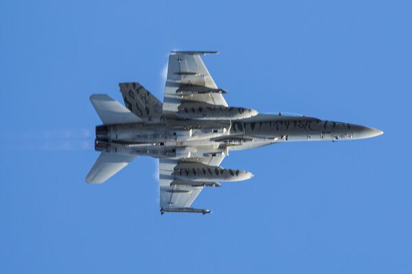 Американский истребитель F-18 во время совместных учений войск НАТО Trident Juncture 2018 (Единый трезубец) в Норвегии Американский истребитель F-18 во время совместных учений войск НАТО Trident Juncture 2018 (Единый трезубец) в Норвегии