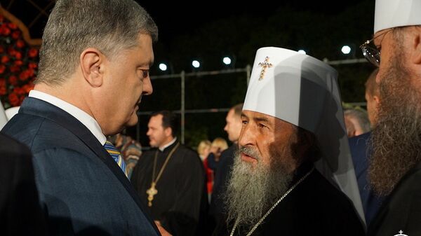 Блаженнейший Митрополит Киевский и всея Украины Онуфрий и Петр Порошенко на акции Первая минута мира, которая состоялась в мемориальном комплексе Национальный музей истории Украины во Второй мировой войне. 8 мая 2018 Блаженнейший Митрополит Киевский и всея Украины Онуфрий и Петр Порошенко на акции Первая минута мира, которая состоялась в мемориальном комплексе Национальный музей истории Украины во Второй мировой войне. 8 мая 2018