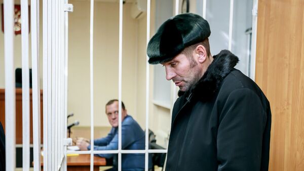 Житель Сургута Павел Шаповалов, обвиняемый в попытке угона воздушного судна Аэрофлота, на заседании Ханты-Мансийского районного суда. 23 января 2019 Житель Сургута Павел Шаповалов, обвиняемый в попытке угона воздушного судна Аэрофлота, на заседании Ханты-Мансийского районного суда. 23 января 2019