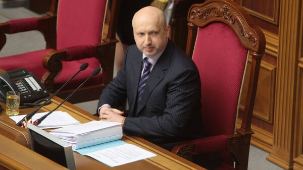 Исполняющий обязанности президента Украины Александр Турчинов на заседании Верховной рады в Киеве Исполняющий обязанности президента Украины Александр Турчинов на заседании Верховной рады в Киеве