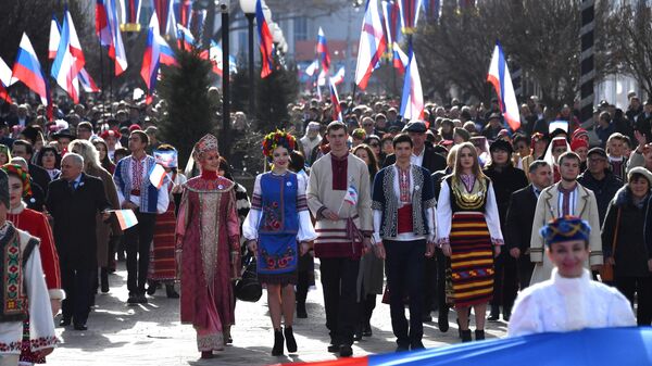 Праздничное шествие во время мероприятий, посвященных 5-й годовщине Общекрымского референдума 2014 года и воссоединения Крыма с Россией, в Симферополе Праздничное шествие во время мероприятий, посвященных 5-й годовщине Общекрымского референдума 2014 года и воссоединения Крыма с Россией, в Симферополе