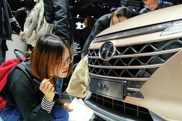 Автомобиль Hyundai Nexo на автосалоне в Шанхае Автомобиль Hyundai Nexo на автосалоне в Шанхае