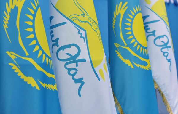 Флаги с символикой партии Нур Отан Флаги с символикой партии Нур Отан