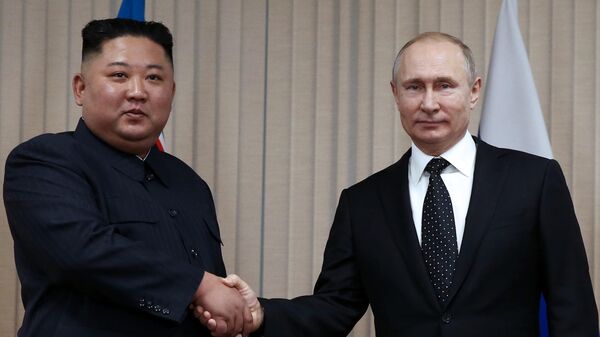 Президент РФ Владимир Путин и председатель Госсовета КНДР Ким Чен Ын Президент РФ Владимир Путин и председатель Госсовета КНДР Ким Чен Ын