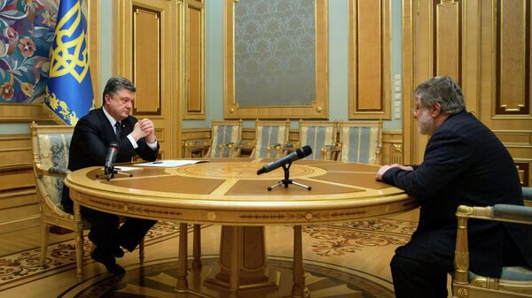 Президент Украины Петр Порошенко и бизнесмен Игорь Коломойский в Киеве. 25 марта 2015 Президент Украины Петр Порошенко и бизнесмен Игорь Коломойский в Киеве. 25 марта 2015