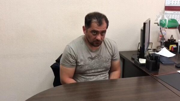Кадры с задержанным по делу об убийстве экс-спецназовца в Подмосковье Кадры с задержанным по делу об убийстве экс-спецназовца в Подмосковье