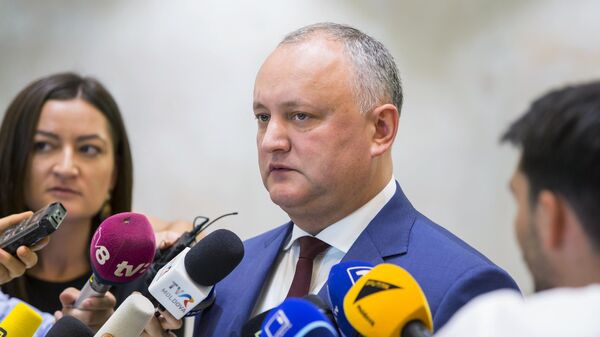 ÐÑÐµÐ·Ð¸Ð´ÐµÐ½Ñ Ðолдавии ÐгоÑÑ Ðодон обÑаеÑÑÑ Ñ Ð¶ÑÑналиÑÑами поÑле заÑÐµÐ´Ð°Ð½Ð¸Ñ ÐºÐ°Ð±Ð¸Ð½ÐµÑа миниÑÑÑов в паÑламенÑе Ðолдавии в ÐиÑиневе