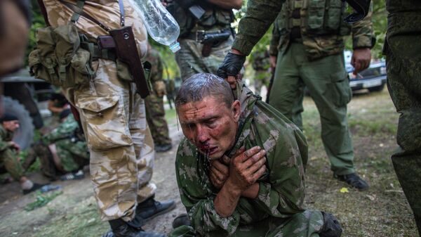 Украинский десантник, взятый в плен в ходе боя за город Шахтерск Украинский десантник, взятый в плен в ходе боя за город Шахтерск