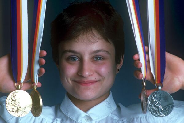 Медали олимпийской чемпионки по спортивной гимнастике Елена Шушунова. XXIV летние Олимпийские игры. Медали олимпийской чемпионки по спортивной гимнастике Елена Шушунова. XXIV летние Олимпийские игры.