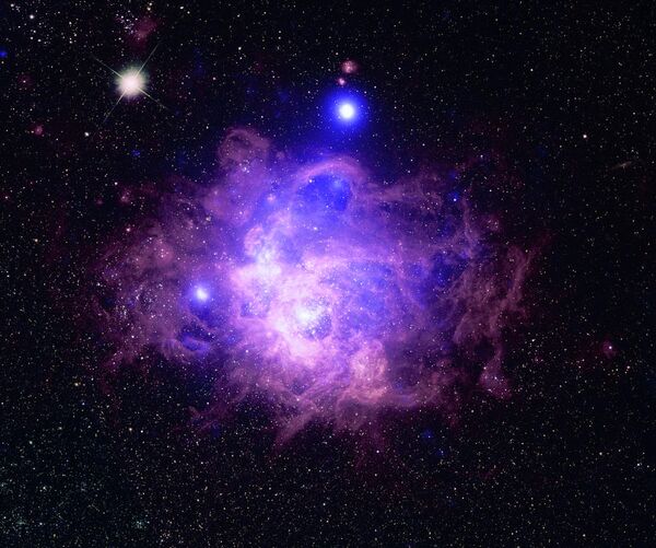 Звездообразование NGC 604 в Галактике Треугольника Звездообразование NGC 604 в Галактике Треугольника