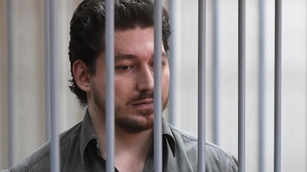 Кирилл Жуков, первый обвиняемый по уголовному делу о массовых беспорядках в центре Москвы 27 июля, во время рассмотрения ходатайства следствия об аресте в Пресненском суде Москвы. 2 августа 2019 Кирилл Жуков, первый обвиняемый по уголовному делу о массовых беспорядках в центре Москвы 27 июля, во время рассмотрения ходатайства следствия об аресте в Пресненском суде Москвы. 2 августа 2019