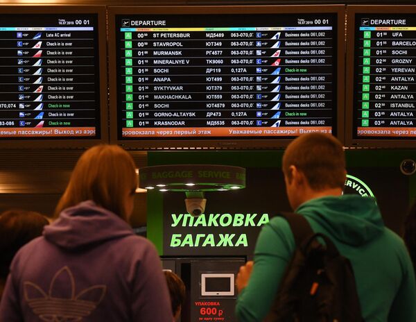 Электронное табло с информацией о рейсах в аэропорту Внуково имени А. Н. Туполева Электронное табло с информацией о рейсах в аэропорту Внуково имени А. Н. Туполева