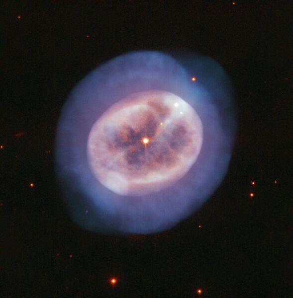 Фотография планетарной туманности NGC 2022 в созвездии Ориона Фотография планетарной туманности NGC 2022 в созвездии Ориона