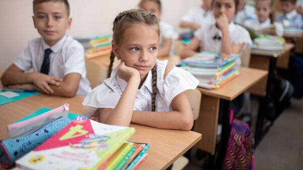 Правительство утвердило президентские выплаты школьникам со второго августа