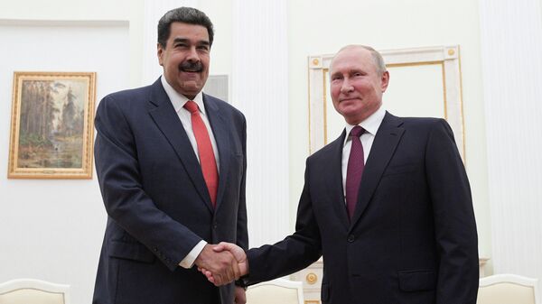 Президент РФ Владимир Путин и президент Венесуэлы Николас Мадуро во время встречи Президент РФ Владимир Путин и президент Венесуэлы Николас Мадуро во время встречи