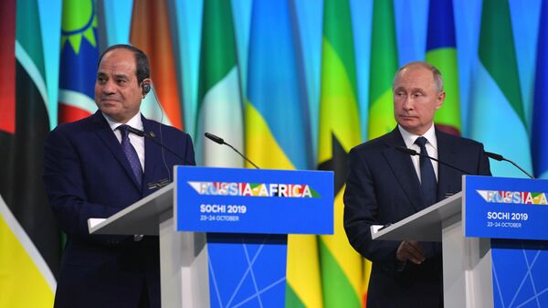 Путин в шутку пообещал ас-Сиси часть зарплаты за помощь на саммите