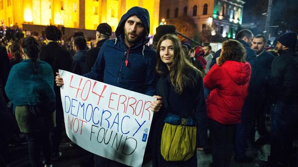 Участники акции протеста в Тбилиси против правящих властей. 14 ноября 2019 Участники акции протеста в Тбилиси против правящих властей. 14 ноября 2019
