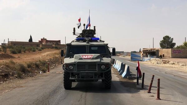 Бронеавтомобиль патрульной службы военной полиции России в Сирии Бронеавтомобиль патрульной службы военной полиции России в Сирии