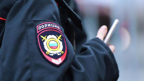 Эмблема на форме сотрудника полиции Эмблема на форме сотрудника полиции