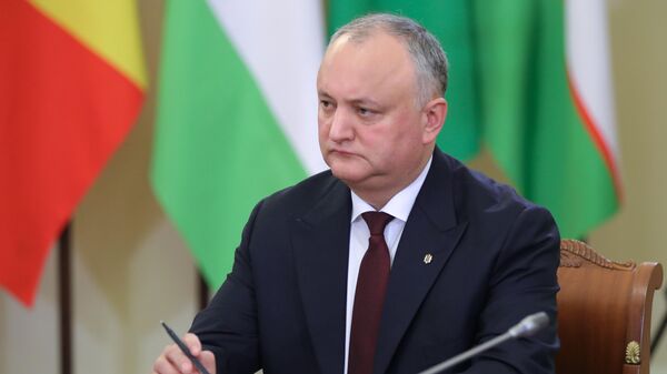 Додон прокомментировал отмену получения Молдавией кредита от России